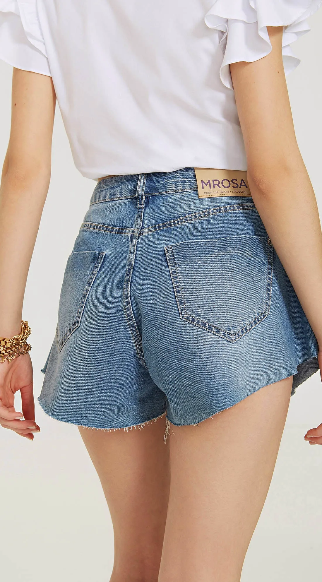 FRAYED DENIM SHORTS WITH EMBELLISHED SIDES